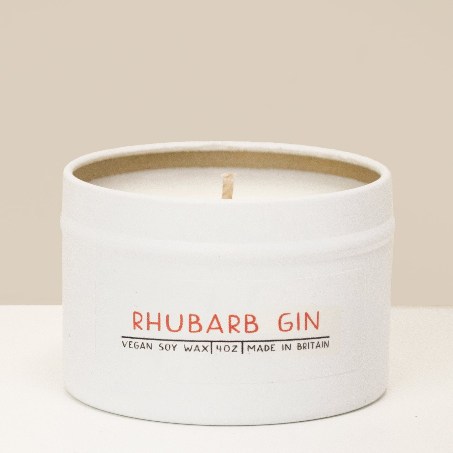 Tin candle, Rhubarb gin - Like a fruity summer punch.