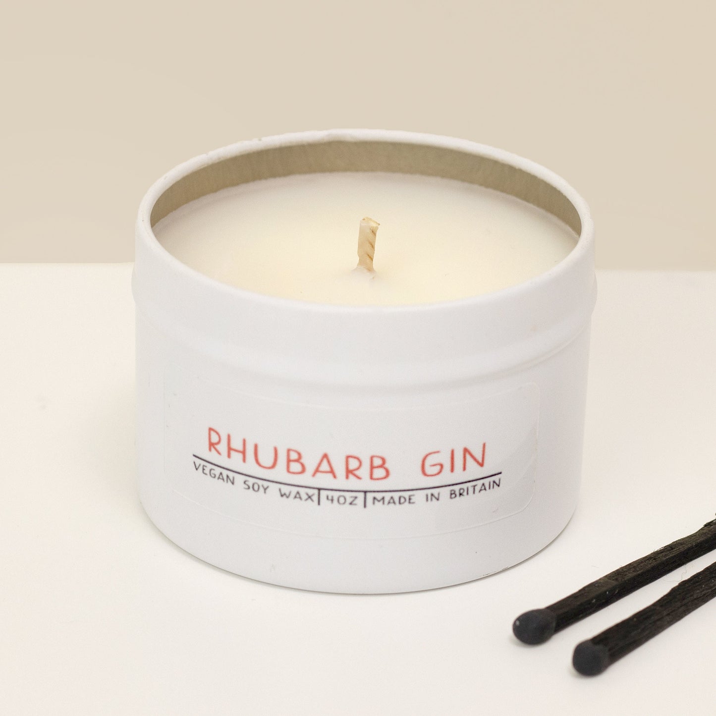 Tin candle, Rhubarb gin - Like a fruity summer punch.